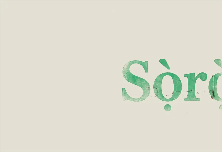 Specimenplaat: Sọ̀rọ̀ in groene inkt, met diakritische tekens